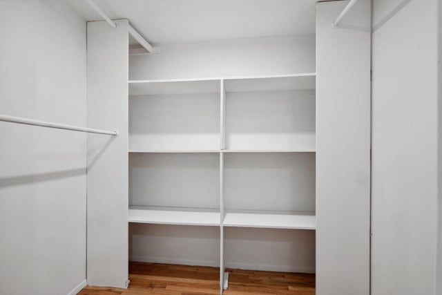 4 Penn Ct, Dix Hills, NY 11746 - walk in closet with wood finished floors