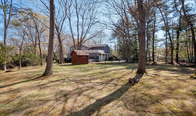 4 Penn Ct, Dix Hills, NY 11746 - view of green lawn with an outbuilding and a storage unit