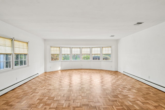 4 Penn Ct, Dix Hills, NY 11746 - empty room featuring baseboard heating and baseboards