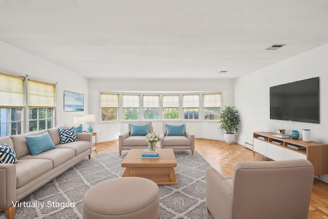 4 Penn Ct, Dix Hills, NY 11746 - living area featuring plenty of natural light and baseboard heating