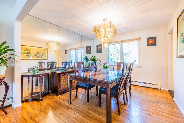 1170 Carlls Straight Path, Dix Hills, NY 11746 - dining space with an inviting chandelier, light wood-style flooring, a wealth of natural light, and baseboard heating