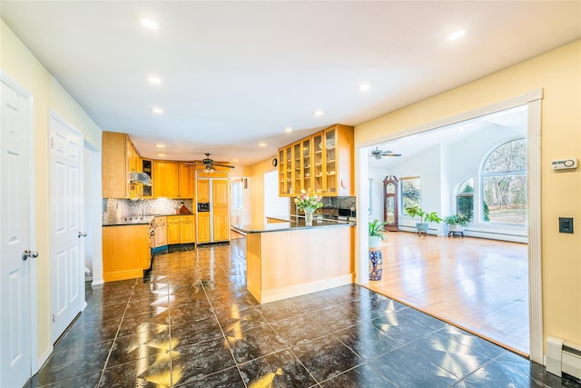 1170 Carlls Straight Path, Dix Hills, NY 11746 - kitchen with a baseboard radiator, decorative backsplash, glass insert cabinets, and ceiling fan