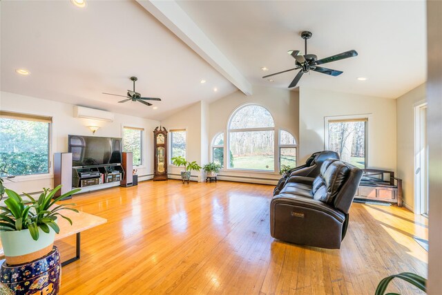 1170 Carlls Straight Path, Dix Hills, NY 11746 - living room with a ceiling fan, vaulted ceiling with beams, light wood finished floors, and a wealth of natural light