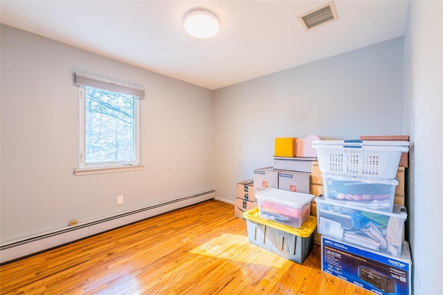 1170 Carlls Straight Path, Dix Hills, NY 11746 - storage featuring a baseboard heating unit and visible vents
