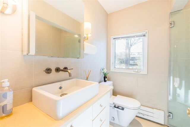 1170 Carlls Straight Path, Dix Hills, NY 11746 - full bathroom with vanity, tile walls, toilet, a shower stall, and a baseboard radiator