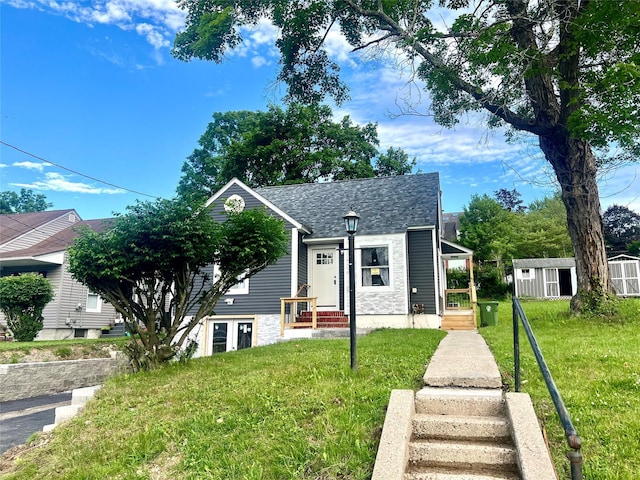 8-10 Mercer St, Middletown, NY 10940 - view of front of house featuring a front yard and a shingled roof
