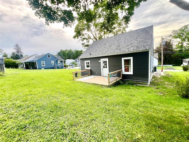 8-10 Mercer St, Middletown, NY 10940 - back of property with roof with shingles, a lawn, and a wooden deck