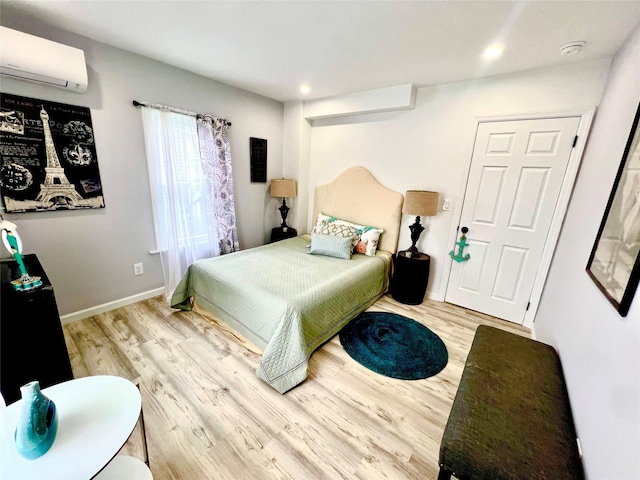 8-10 Mercer St, Middletown, NY 10940 - bedroom with a wall unit AC, light wood finished floors, and recessed lighting