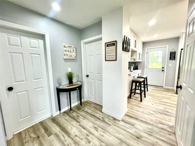 8-10 Mercer St, Middletown, NY 10940 - foyer entrance with light wood-type flooring and baseboards