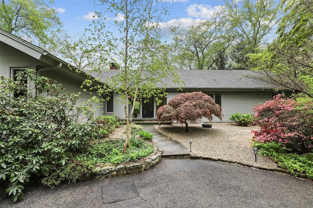view of front of property with a chimney
