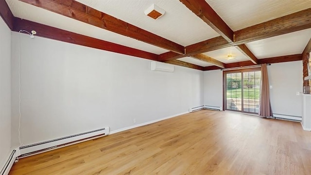 empty room featuring a baseboard heating unit, an AC wall unit, wood finished floors, and beam ceiling