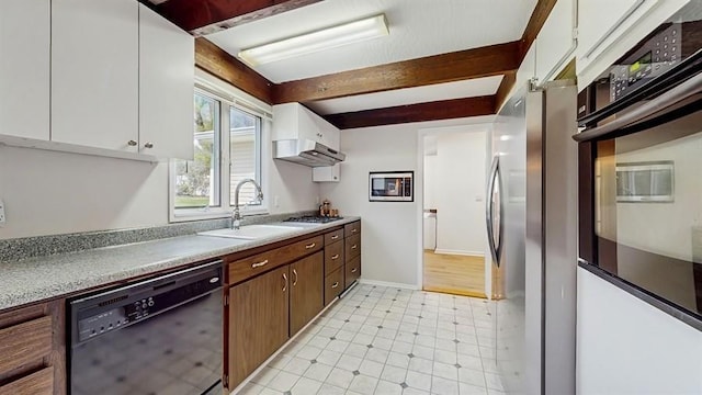 kitchen with a sink, beamed ceiling, wall oven, black dishwasher, and white cabinetry