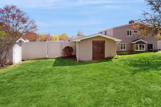 exterior space featuring a gate and fence