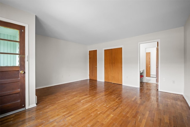 75 Vails Gate Heights Dr, Vails Gate, NY 12553 - empty room with wood finished floors, baseboards, and baseboard heating