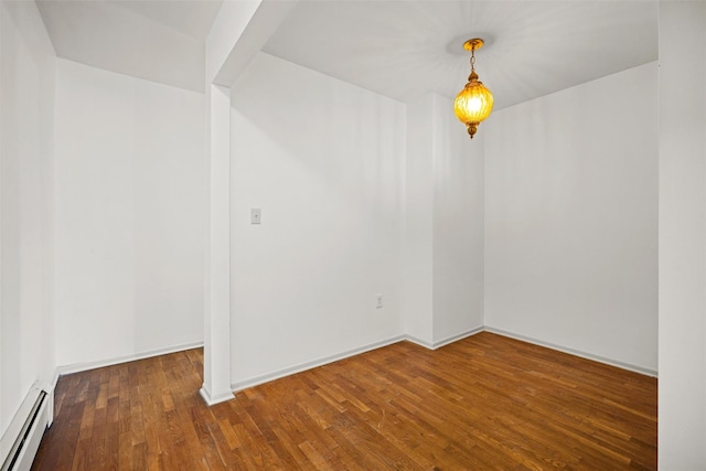 75 Vails Gate Heights Dr, Vails Gate, NY 12553 - spare room featuring a baseboard radiator and wood finished floors
