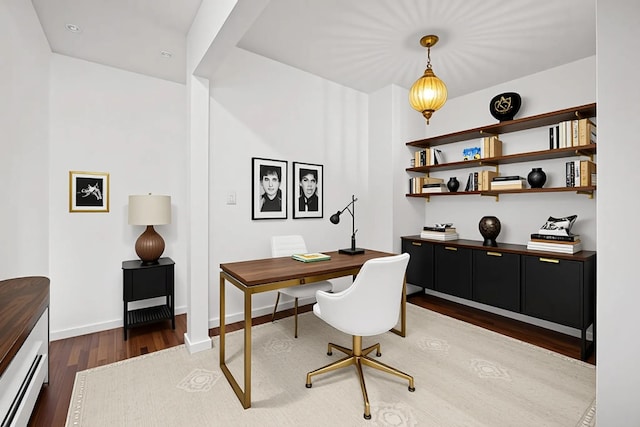 75 Vails Gate Heights Dr, Vails Gate, NY 12553 - office space featuring wood finished floors, a baseboard radiator, and baseboards