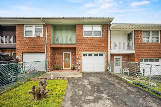 75 Vails Gate Heights Dr, Vails Gate, NY 12553 - view of property with driveway, a garage, and brick siding
