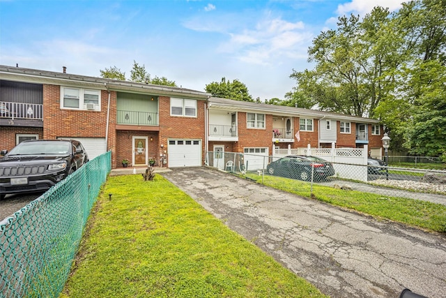 75 Vails Gate Heights Dr, Vails Gate, NY 12553 - view of property with driveway, an attached garage, and brick siding