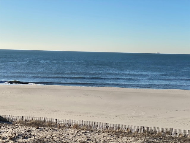 700 Shore Rd Unit 2Z, Long Beach, NY 11561 - water view featuring fence and a beach view