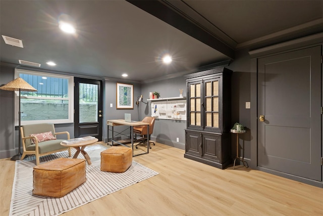 office space with crown molding, wood finished floors, baseboards, and recessed lighting
