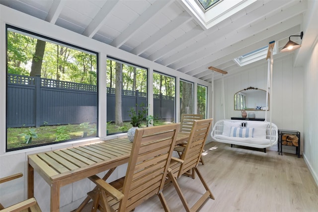 sunroom / solarium featuring a skylight