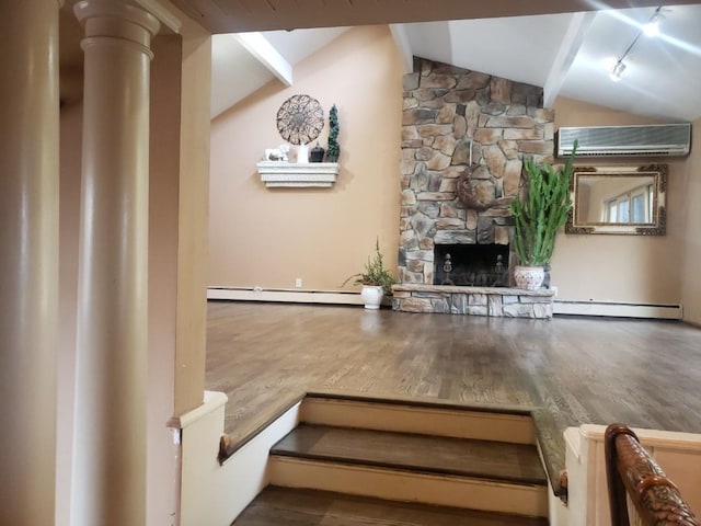 living room with a baseboard radiator, wood finished floors, lofted ceiling with beams, and a wall mounted air conditioner