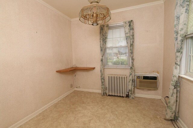 22 Primrose Dr, New Hyde Park, NY 11040 - spare room featuring radiator, tile patterned floors, a wall mounted air conditioner, ornamental molding, and a chandelier