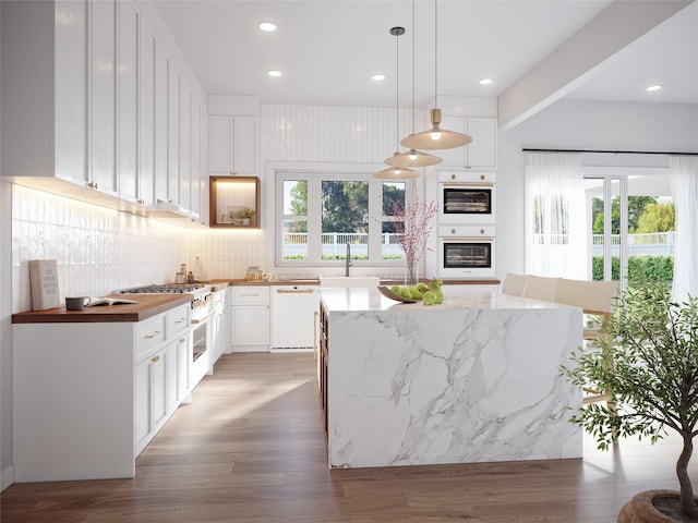 36 Secor Rd, Scarsdale, NY 10583 - kitchen featuring white appliances, backsplash, white cabinetry, light stone counters, and recessed lighting