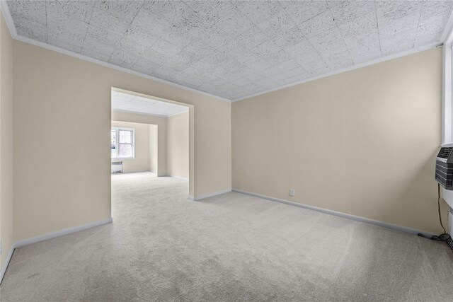 6107 Grand Ave, Maspeth, NY 11378 - spare room with ornamental molding, carpet floors, and baseboards