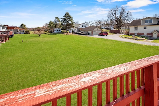 view of yard featuring a residential view