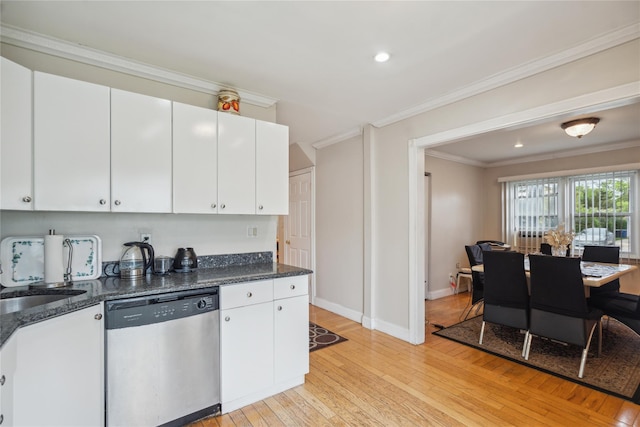 kitchen featuring dishwasher, light wood-type flooring, crown molding, white cabinets, and baseboards