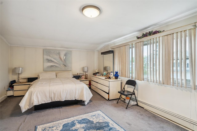 bedroom with a baseboard radiator, carpet flooring, and vaulted ceiling