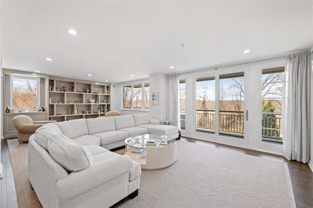 100 Harbor View Dr Unit 230, Port Washington, NY 11050 - living area with recessed lighting and dark wood-type flooring