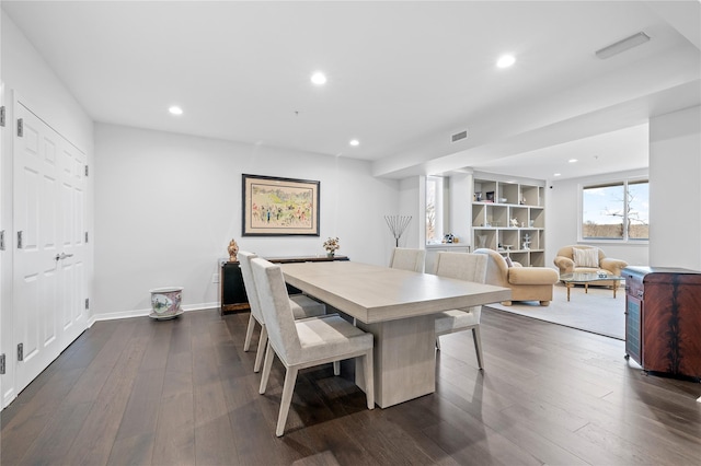 100 Harbor View Dr Unit 230, Port Washington, NY 11050 - dining area featuring dark wood finished floors and recessed lighting