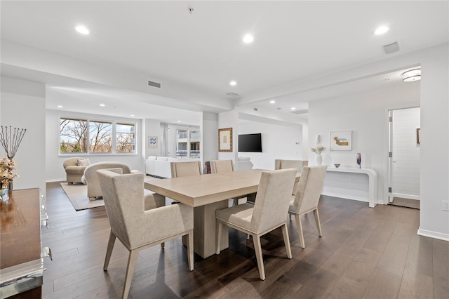 100 Harbor View Dr Unit 230, Port Washington, NY 11050 - dining space with recessed lighting and dark wood-style floors