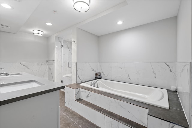 100 Harbor View Dr Unit 230, Port Washington, NY 11050 - full bath with a bath, recessed lighting, a marble finish shower, tile patterned floors, and wainscoting