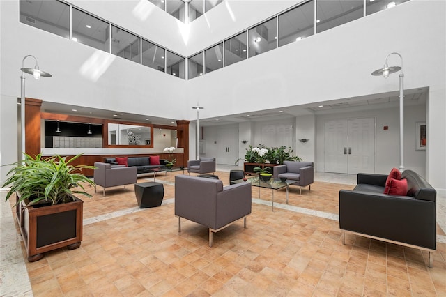 100 Harbor View Dr Unit 230, Port Washington, NY 11050 - building lobby with a towering ceiling and recessed lighting