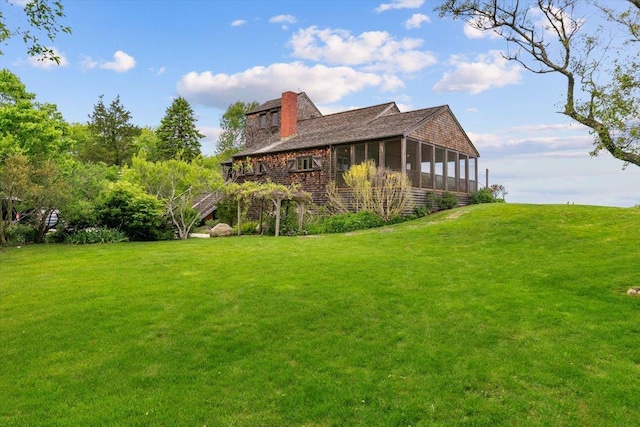 1635 Isabella Beach Rd, Fishers Island, NY 06390 - view of grassy yard featuring a sunroom and stairs