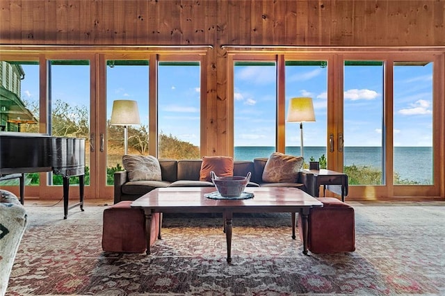 1635 Isabella Beach Rd, Fishers Island, NY 06390 - sunroom / solarium featuring french doors and a water view