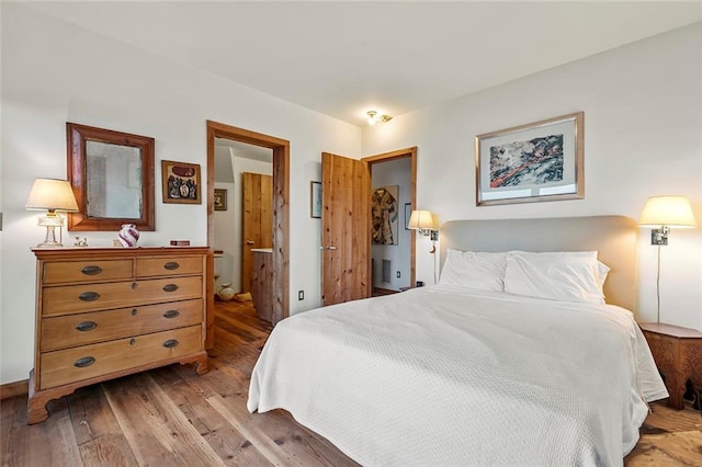 1635 Isabella Beach Rd, Fishers Island, NY 06390 - bedroom featuring light wood finished floors and ensuite bathroom