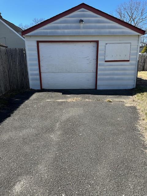 detached garage with fence