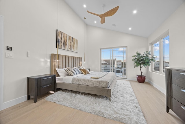 bedroom featuring high vaulted ceiling, baseboards, light wood finished floors, and recessed lighting