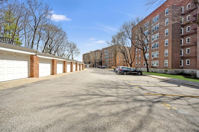100 Dehaven Dr Unit 612, Yonkers, NY 10703 - view of asphalt street with community garages
