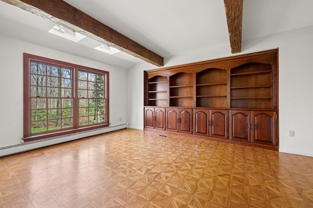 22 Druid Hill Rd, Port Jefferson, NY 11777 - empty room with a baseboard radiator, beam ceiling, baseboards, and a skylight
