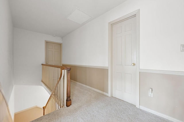 22 Druid Hill Rd, Port Jefferson, NY 11777 - corridor with an upstairs landing, carpet floors, and attic access