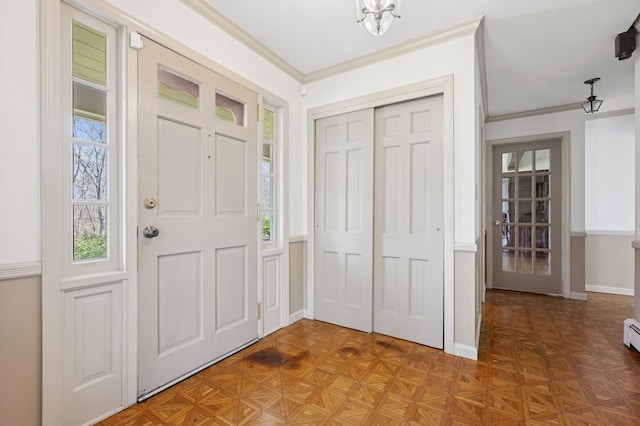 22 Druid Hill Rd, Port Jefferson, NY 11777 - entryway featuring ornamental molding and baseboards