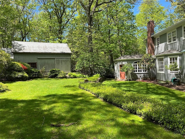 22 Druid Hill Rd, Port Jefferson, NY 11777 - view of grassy yard with an outbuilding