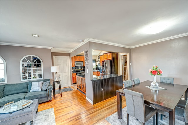 2892 Wilson Ave, Bellmore, NY 11710 - interior space with plenty of natural light, light wood-type flooring, and ornamental molding