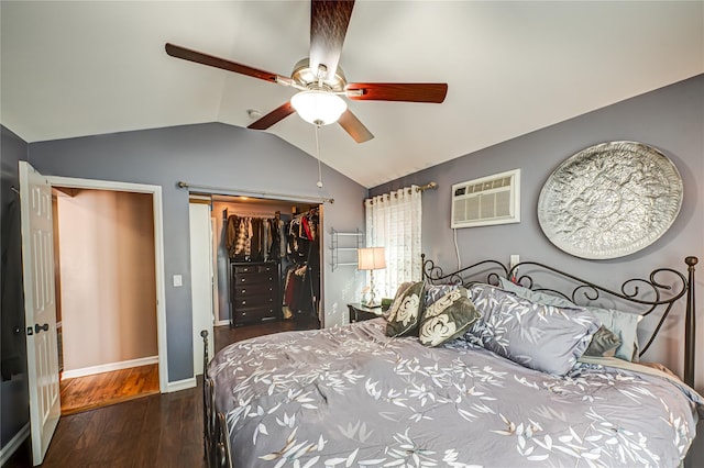2892 Wilson Ave, Bellmore, NY 11710 - bedroom featuring a wall unit AC, lofted ceiling, baseboards, a closet, and wood finished floors