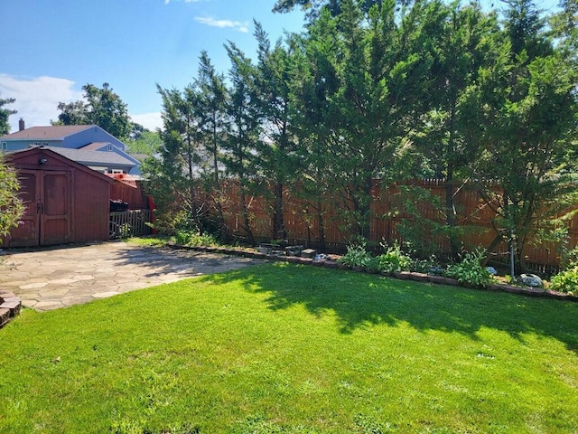 2892 Wilson Ave, Bellmore, NY 11710 - view of yard with a patio, an outbuilding, fence, and a storage shed
